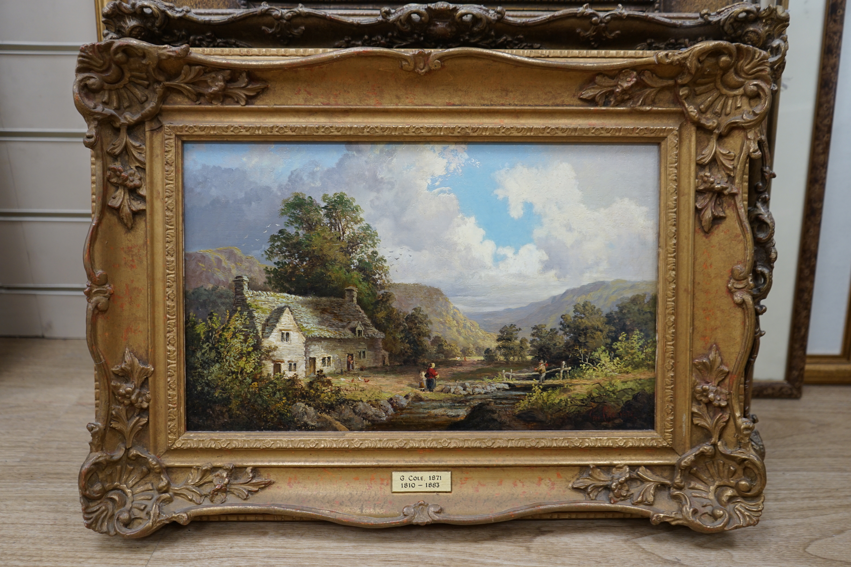 George Cole (1810-1883), oil on canvas, Welsh landscape with cottage, signed and dated 1871, indistinctly inscribed in ink verso, 24 x 39cm